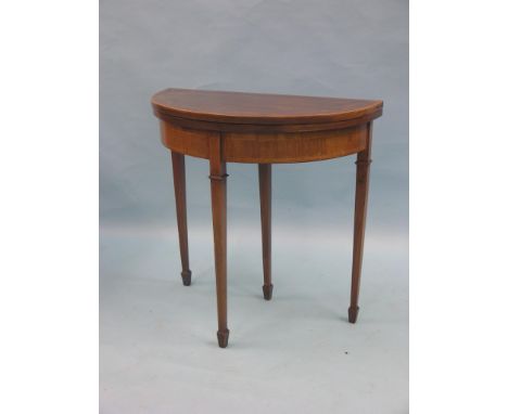 A Georgian-style mahogany card table, half-round with baize-lined top, inlaid detail, on square tapering legs, 2ft. 6in.