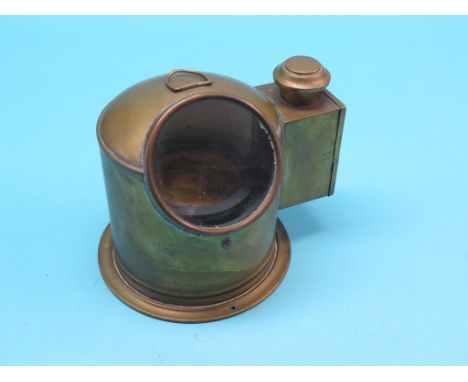 A ship's binnacle, brass case with oil lamp, compass on gimbal, 9in. high 