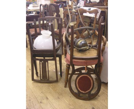 A 19th century continental walnut and marquetry elbow chair, together with a pair of Edwardian inlaid mahogany drawing room s