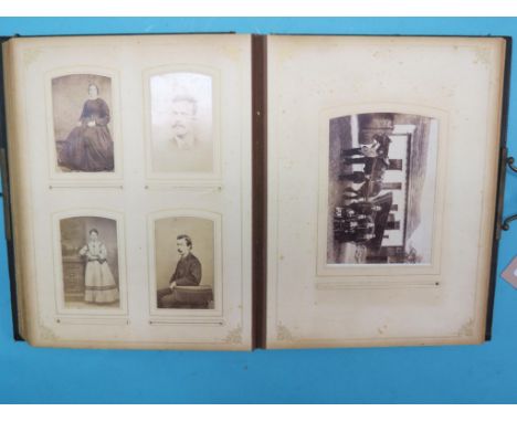 A Victorian leather-bound portrait photograph album