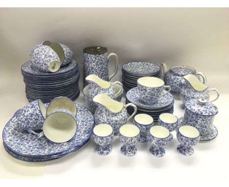 A blue and white Royal Doulton tea service with transfer printed floral decoration.