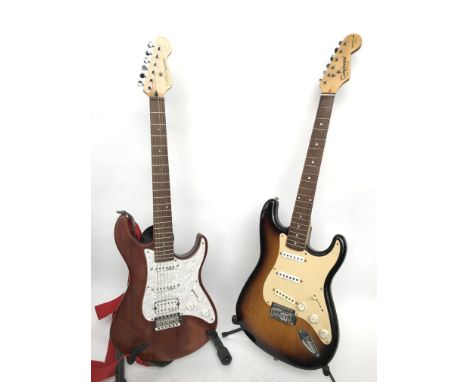 Two Stratocaster style electric guitars comprising a Tanglewood Nevada model fitted with two Seymour Duncan single coil picku