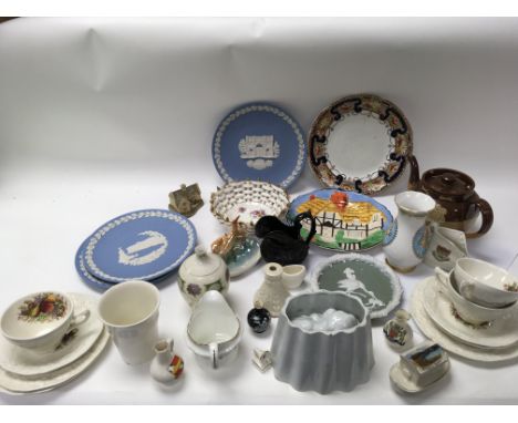 A collection of China and ceramic items including Doulton, Harvest ware, Wedgwood and crested ware. No reserve.