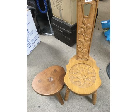 A carved oak stool R.I with a Robin dated 1994 and a modern carved light oak spinning type chair (2)