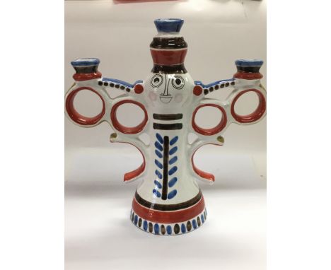 An Italian pottery three branch candelabra by Desimone, approx height 33cm.