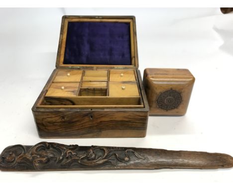 A carved wood paper knife, a small carved box and a well fitted olive wood box - NO RESERVE