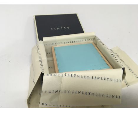 A Quality Luxury ring box or cufflink trinket box with a leather and satinwood design from Viccount Linley. 12cmx12cm in orig