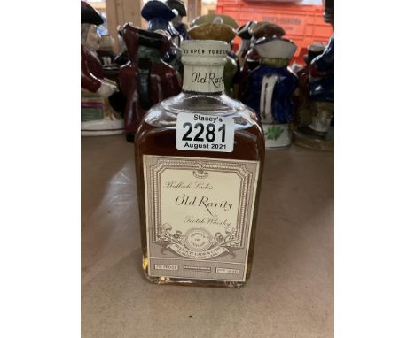 A bottle of Bulloch Lade’s Old Rarity Scotch Whisky.