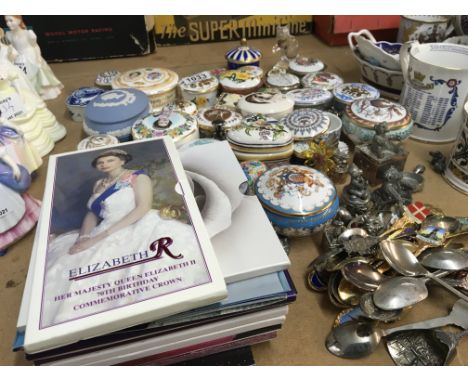 A collection of Royal commemorative small porcelain and some enamel boxes a collection of souvenir spoons and commemorative c