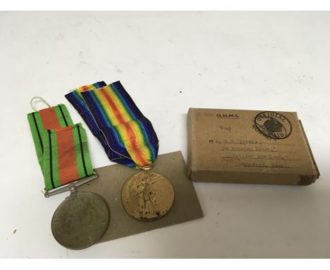 A First World War Medal awarded to K.41795 E.D.IMPEY S.T.O 1RN. and a Second World War medal with box (2)