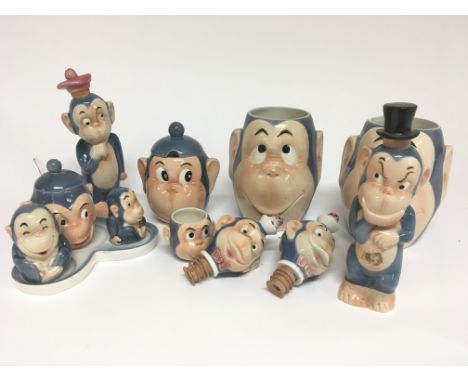 A collection of Goebel Ceramic Happy Chimps figures no obvious damage.