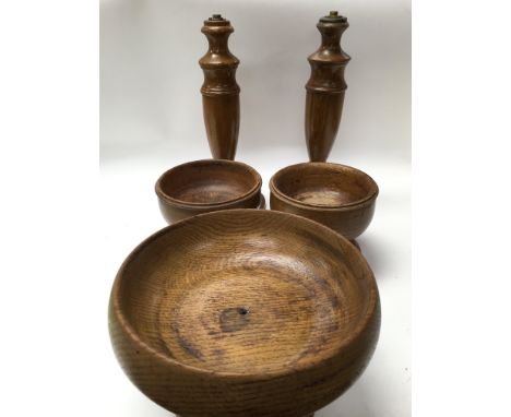 Five good quality treen item; bowls and lamp bases.