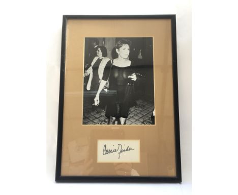 A framed and glazed Carrie Fisher autograph and monochrome photographic print of a picture believed to have been taken by Dav