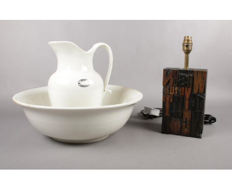 A large water jug  with 'Best Hospital' on the side and wash bowl made by W.Adams &amp; Sons together with a wooden print blo