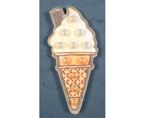 A battery powered light up ice cream sign.  