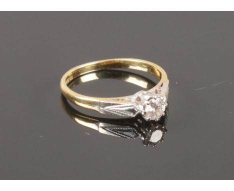 A 18ct Gold &amp; Platinum diamond solitaire ring, size K, 2.25 g  