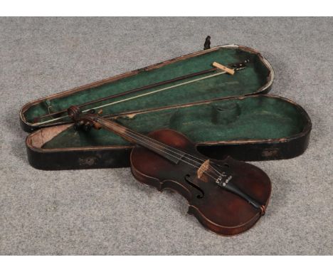A cased continental violin with two piece back, stained fruitwood finger board, ( 36cm length of back). Inscribed R Graham to