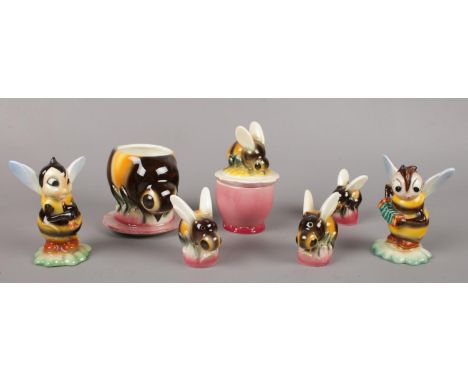 A Goebel bumble bee cruet set to include honey pot, salt and pepper pots, preserve pot along with two Goebel bumble bee music