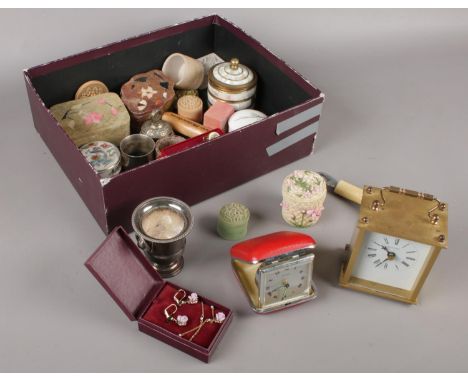 A box of collectables to include trinket boxes, bottle openers, clock, cuff links, etc.  
