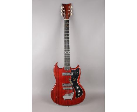 A Kay model no K-2T electric guitar (young adult). Height 99cm. Decorated in reddish brown colour.  Please note that this gui