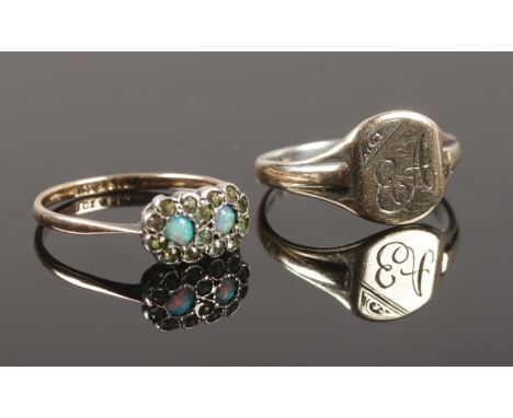 Two 9ct gold and silver rings, one a signet ring monogrammed EA, the other a cluster ring.  