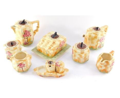 A group of Beswick early 20thC pottery breakfast wares decorated in the Sundial pattern, impressed marks, comprising teapot, 