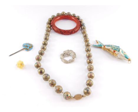 Chinese jewellery, including a cinnabar lacquer bangle, articulated fish, silver brooch and an enamel hair ornament. (a quant