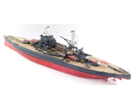 A plastic kit model of the USS Arizona, fully rigged with armaments, figures, planes, etc. 91cm wide.