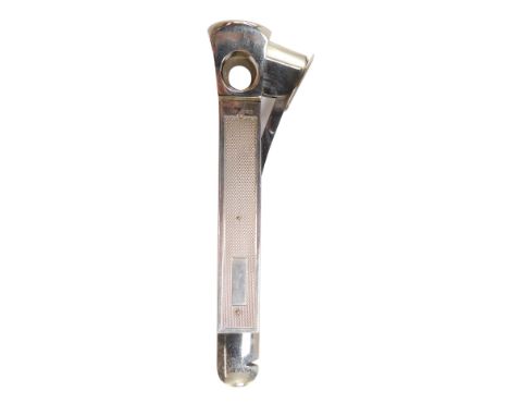 A silver cigar cutter, with engine turned decoration, Birmingham 1982, 4.3oz.