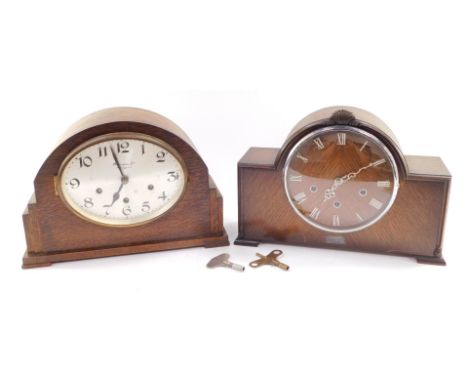 A Smiths oak cased 1940's mantel clock, dial bearing Roman numerals, eight day movement with Westminster chimes, the case bea