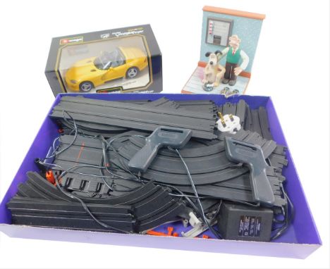 A Burago die cast model of a Dodge Viper, RT/10, scale 1:18, 3065, boxed, together with Scalextric and a Wesco Wallace &amp; 