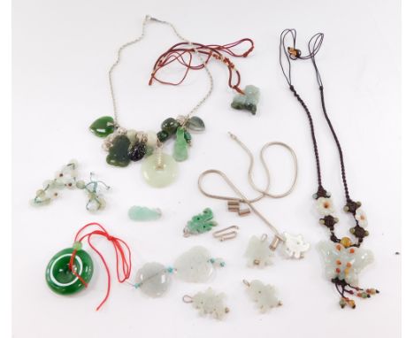 A group of Chinese jade jewellery, including pendants, necklaces and earrings. (a quantity) 