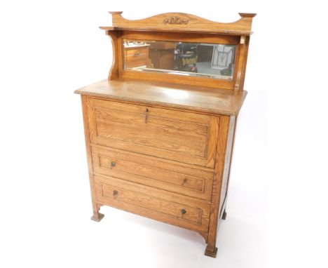 A Victorian Art Nouveau mirror back sideboard, with a drop flap opening to reveal a single shelf, over two frieze drawers, ra