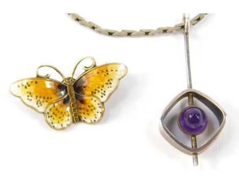 A Norwegian silver gilt and enamel butterfly brooch, designed by Horoar Prydz, together with a Finnish silver and amethyst pe