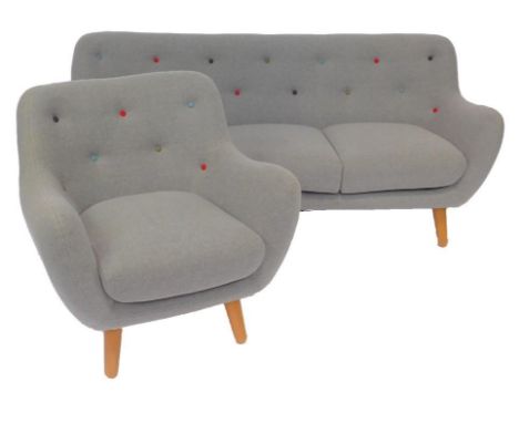 A two seated tub sofa, upholstered in multi coloured button back grey fabric, raised on light oak turned legs, 186cm long, to