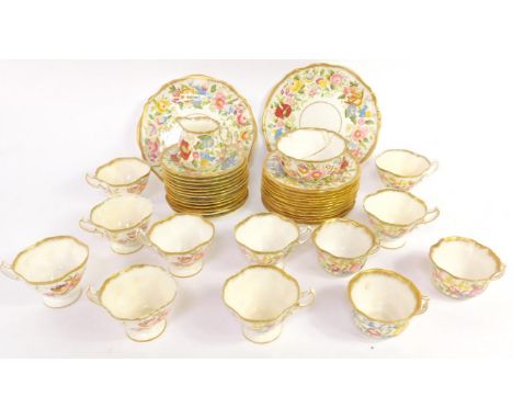 A Hammersley & Co bone china tea service, with polychrome floral decoration and gilt borders, comprising milk jug and sugar b