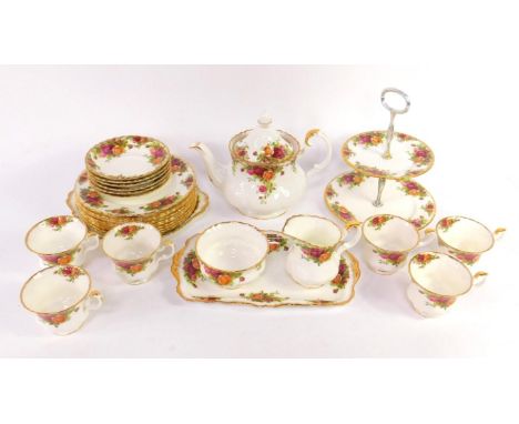 A Royal Albert porcelain part tea service decorated in the Old Country Roses pattern, comprising teapot, cream jug, sugar bow