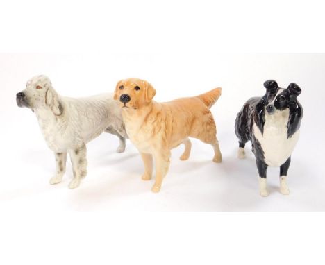 A Beswick figure of an English setter, Bayldone Baronet, a Collie, and a golden retriever. (3).