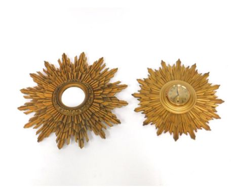 A gilt plaster sunburst wall mirror, together with a matching wall clock, with a eight day movement, with key, 46.5cm and 38c