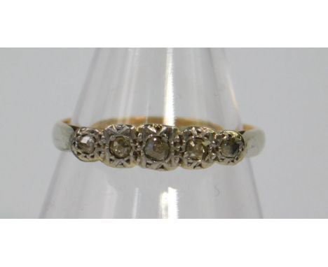 A rose cut diamond five stone ring, set in yellow and white metal, stamped 18ct, size K, 2.2g.