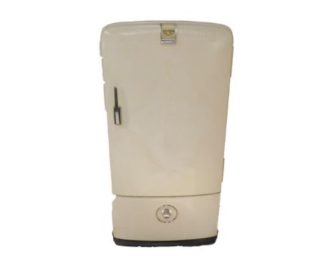 A Frigidaire refrigerator, white enamel, fully fitted including an ice cube tray.