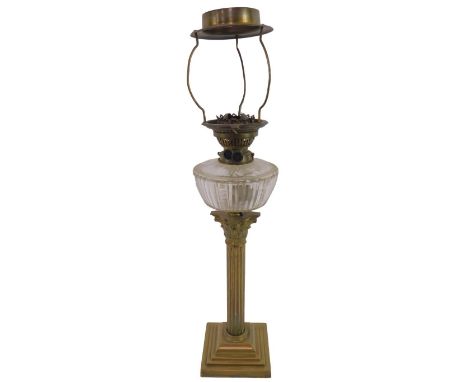 A brass Corinthian column oil lamp, with cut glass reservoir, converted to electricity, 70cm high.