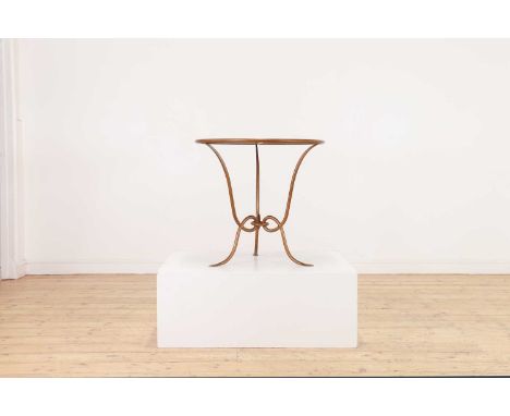 A gilt-metal 'Larson' side table by Julian Chichester,of recent manufacture, the circular verre églomisé top raised on a knot