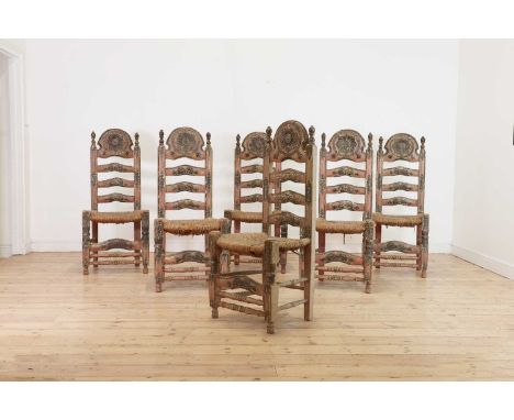 A set of six painted pine 'Andalusian' chairs,20th century, Spanish, each polychrome decorated in pink and black, with a high