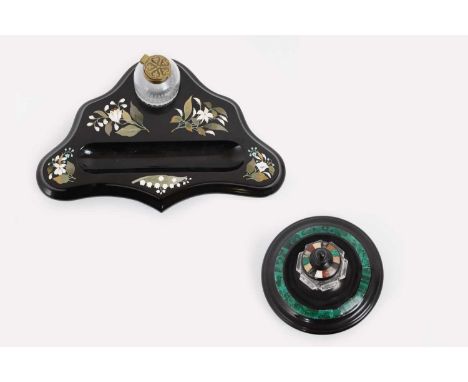 An Ashford black marble deskstand,the cut-glass inkwell with a stylised gilt-metal foliate hinged cover, the stand inlaid wit