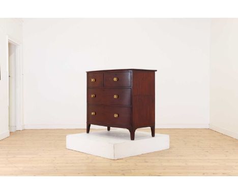 A George III mahogany bow fronted commode,late 18th/early 19th century, fitted with two short over two long drawers, with gil