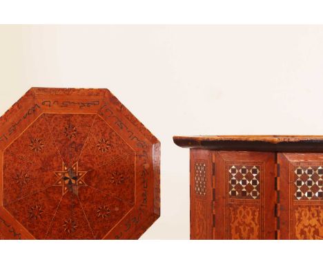 Two inlaid octagonal tables,early 20th century, Syrian, one walnut inlaid with mother-of-pearl, the other fruitwood, amboyna 