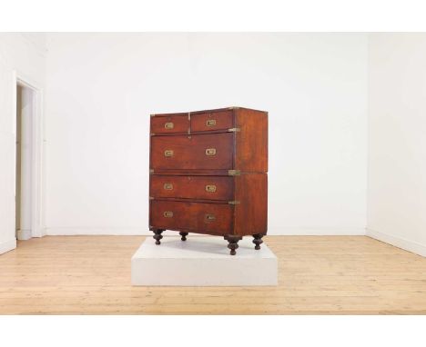 A teak campaign chest,19th century, fitted with two short drawers over three long drawers, with brass recessed handles and co