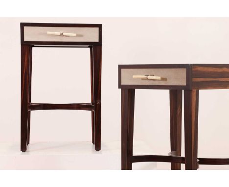A pair of Art Deco-style Macassar ebony side tables,of recent manufacture, each with a faux shagreen square top, over a fitte
