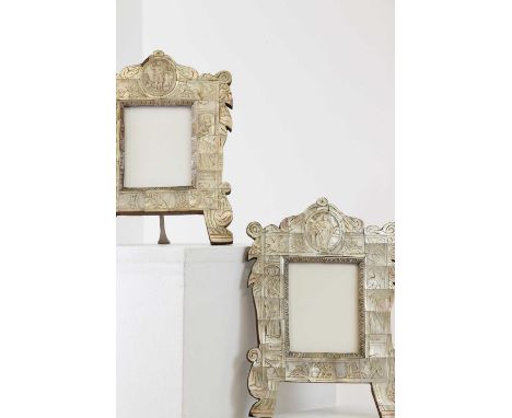 A pair of mother-of-pearl veneered devotional tabernacle frames,19th century, Italian, each shaped wooden frame with a carved